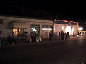 audience at the bus stop opposite the Batajnica Local Community building before...